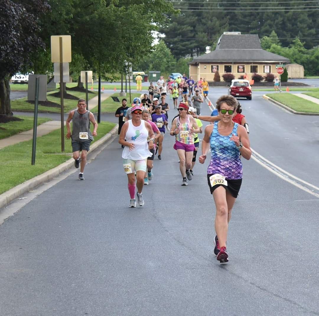 Heidi Novak running in the Frederick Summer Solstice 8K, June 2021